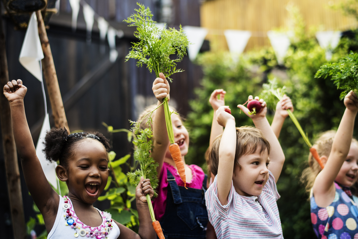 kids raising hands